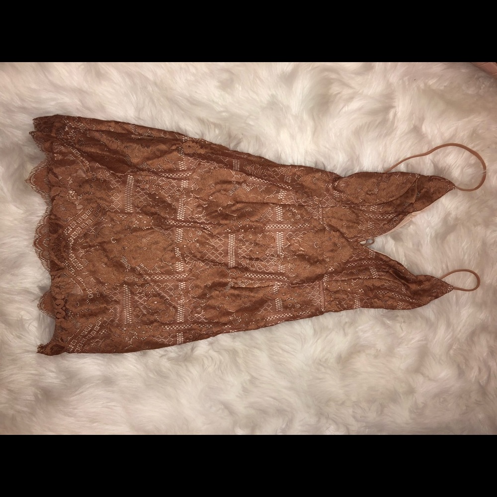 Tight tan lace dress